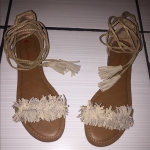 Tie-up tassel fringe sandals